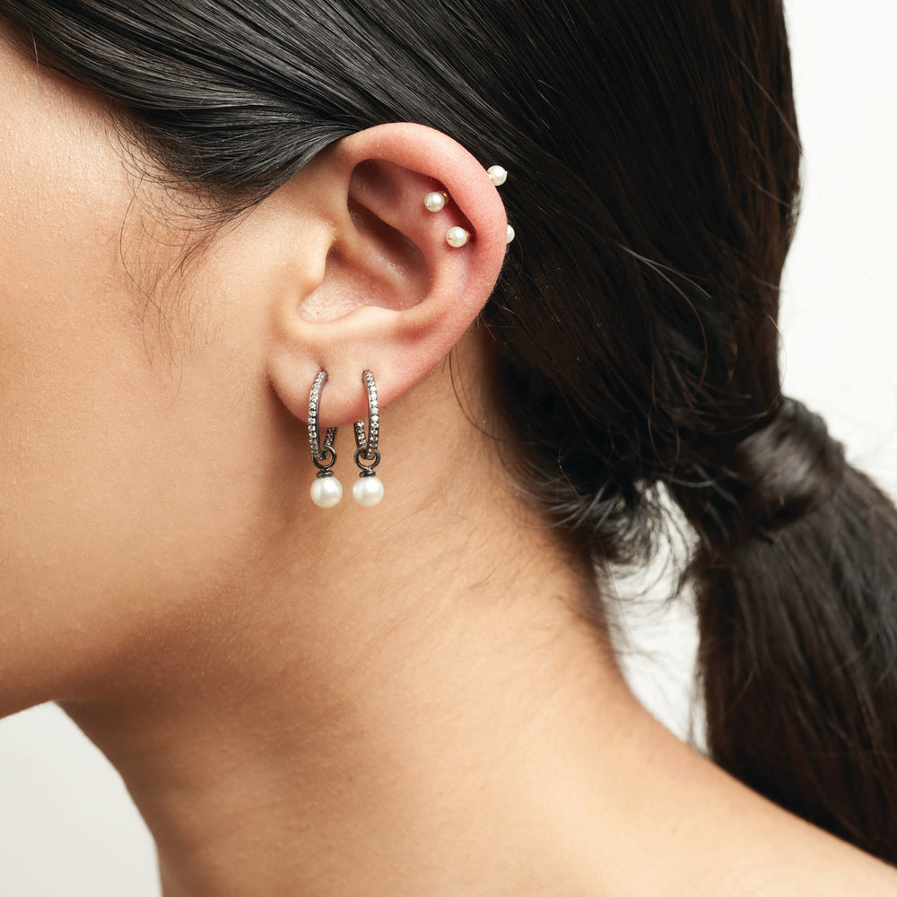 Wear multiple earrings to express your individual style