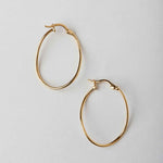 skinny gold twisted hoops 